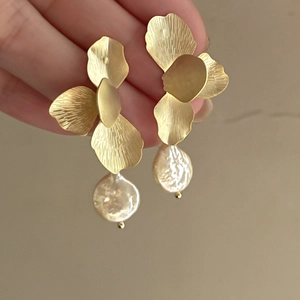 Elegant gold flower petal earrings with baroque white pearls and silver needles for women