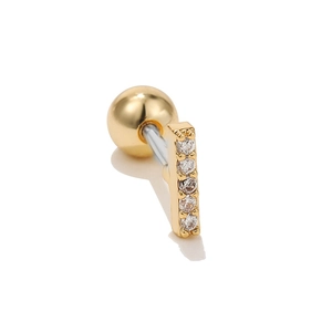 Close-up of golden vertical 5-zircon cartilage stud with steel screw-back ball