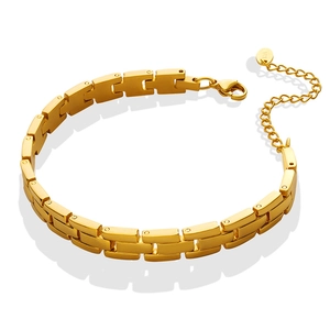 Polished golden stainless steel watchband link bracelet with K18 tag on white background