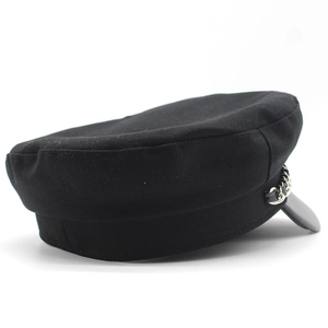 Classic black wool newsboy cap with a leather brim and stylish metal chain detail