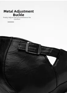 Macro detail of black PU leather hat with adjustable silver metal buckle on white background