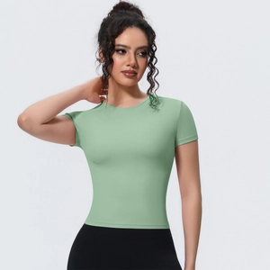 Close-up of mint green slim-fit sports T-shirt featuring breathable high-elastic fabric