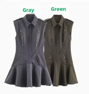 Detail of grey and green double-breasted sleeveless mini dresses with ruffled hemline