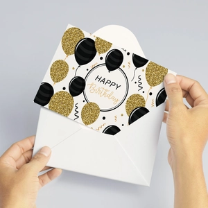 Carte d'anniversaire ballons noir et or avec enveloppe blanche et détails pailletés