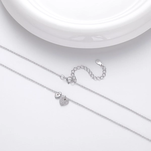 Detail shot of S925 sterling silver stamp on the lobster clasp and adjustable necklace chain