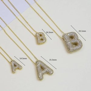 Size chart showing 18k gold plated brass A and B letter pendants with cubic zirconia