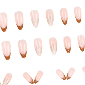Mocha brown almond press-on nails with French tips and silver glitter gradient finish