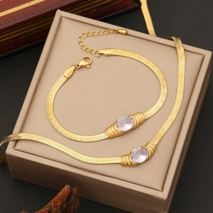 Elegant gold-plated square necklace and bracelet set with white oval stones in a gift box