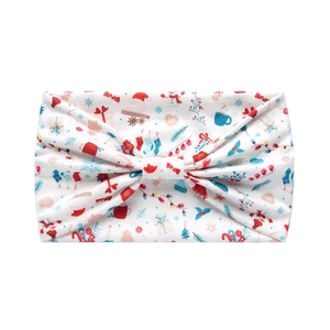 Detail view of a white Christmas bow headband featuring festive winter holiday patterns