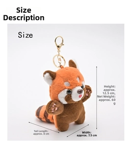 Detail showing red panda plush keychain with size dimensions and golden hardware