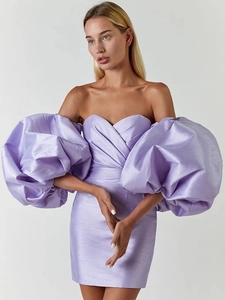 Detail of purple satin off-shoulder mini dress featuring dramatic lantern puffy sleeves