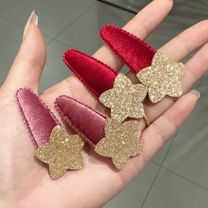 Fermagli per capelli a stella in velluto glitterato per bambine rosso e viola