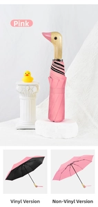 Pink duck head wooden handle umbrella showing black glue and non-glue layers