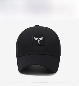 Front view of black twill baseball cap with white embroidered double wings patch logo