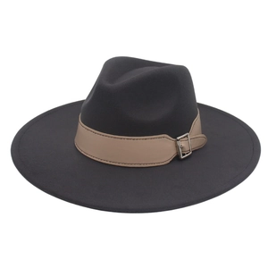 Detailed close-up of wide brim fedora hat with khaki leather belt and silver buckle