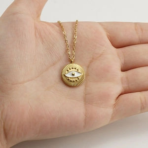Minimalist gold stainless steel evil eye pendant necklace with white enamel detail