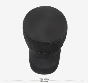 Top view of a vintage black washed denim cadet cap showing material and flat top texture