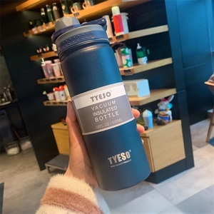 Handheld view of a 530ml navy blue TYESO insulated water bottle with matte finish
