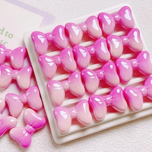 Pink gradient bow beads made of resin for DIY jewelry making and phone chain crafts