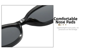 Detail of comfortable integrated nose pads on black oval fashion sunglasses frame