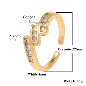 Macro view of gold copper ring with zircon inlay showing 22mm diameter and 8mm width