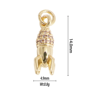 Detail view of a 14mm gold rocket pendant with white cubic zirconia and size parameters