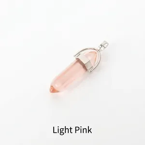 Close-up of a light pink hexagonal crystal column pendant with a silver metal clasp