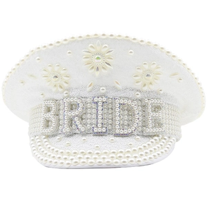 Close-up of white sequin bridal captain hat with pearl flower details and BRIDE lettering