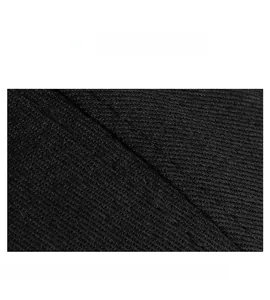 Close-up of precise stitching on black fabric showing premium baseball cap craftsmanship