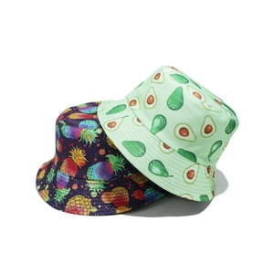 Women's summer bucket hats with tropical pineapple and avocado prints for sun protection