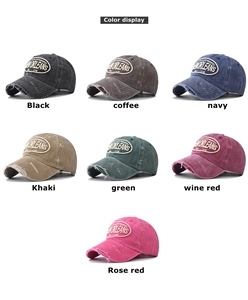 Detail of multi-color distressed cotton baseball caps with New Orleans vintage embroidery