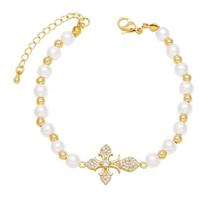 Elegantes Fleur-de-Lis Armband mit weißen Perlen und funkelnden Zirkonia-Verzierungen