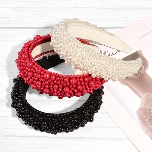 Padded sponge headband with full faux pearl embroidery in white, red, and black colors