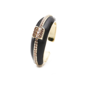 Detail of black enamel open ring with pink crystals and rectangle zircon setting