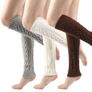 Detail of cable knit leg warmers in gray, beige, and brown with thick woven texture