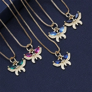 Detailed display of colorful zircon butterfly necklaces on a dark textured background