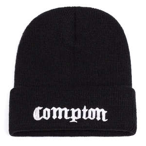 Black Compton knit beanie with white letter embroidery on a clean white background