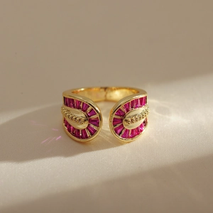 Double-layered gold-plated ring with pink rectangular crystals and fan-shaped design