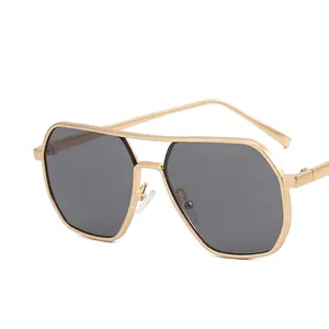 Classic double bridge aviator sunglasses with gold metal frame and dark grey lenses