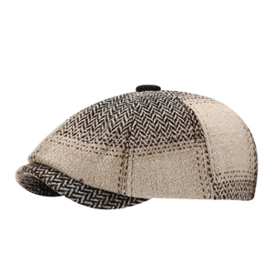 Classic herringbone newsboy cap with vintage British style in khaki and brown tones