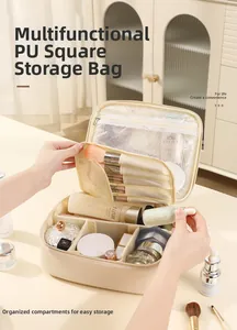 Detail view of large PU makeup bag featuring internal dividers and makeup brush storage