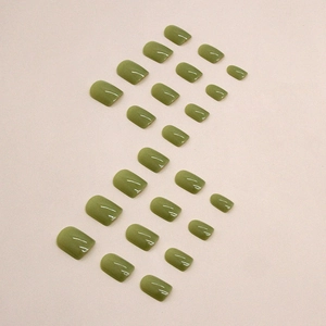 Short square matcha green press-on nails set with 24 pieces in glossy finish