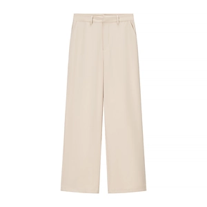 Flat lay of cream wide-leg trousers featuring a high waist and premium tailored fabric