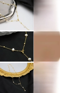 Detailed macro view of natural freshwater pearls and 18K gold-plated chain craftsmanship