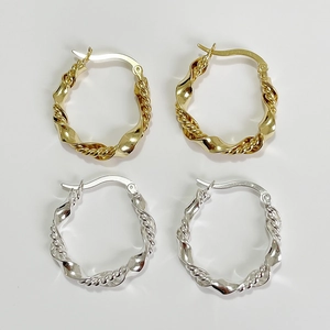 Classic braided hoop earrings in gold and silver finish with polished twist texture