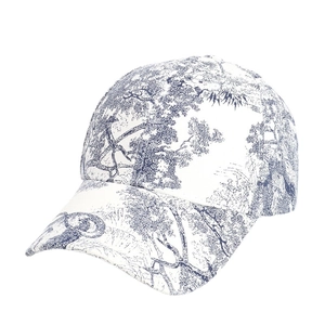 Blue and white landscape print baseball cap with French Toile de Jouy scenic pattern