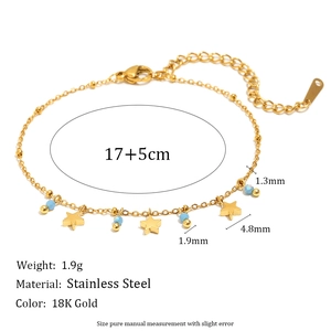 Detail showing 18K gold-plated stainless steel star charm bracelet with size measurements