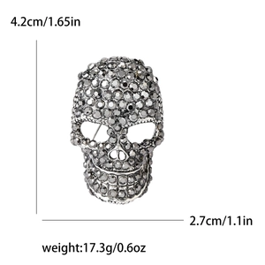 Skull brooch with grey rhinestones in silver plating, 4.2x2.7cm size details