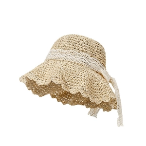 Women's wide brim straw sun hat with white lace ribbon and elegant bow decoration