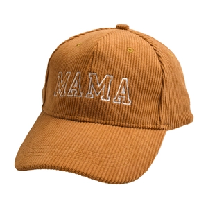 Detailed embroidery of white MAMA lettering on brown corduroy baseball cap fabric